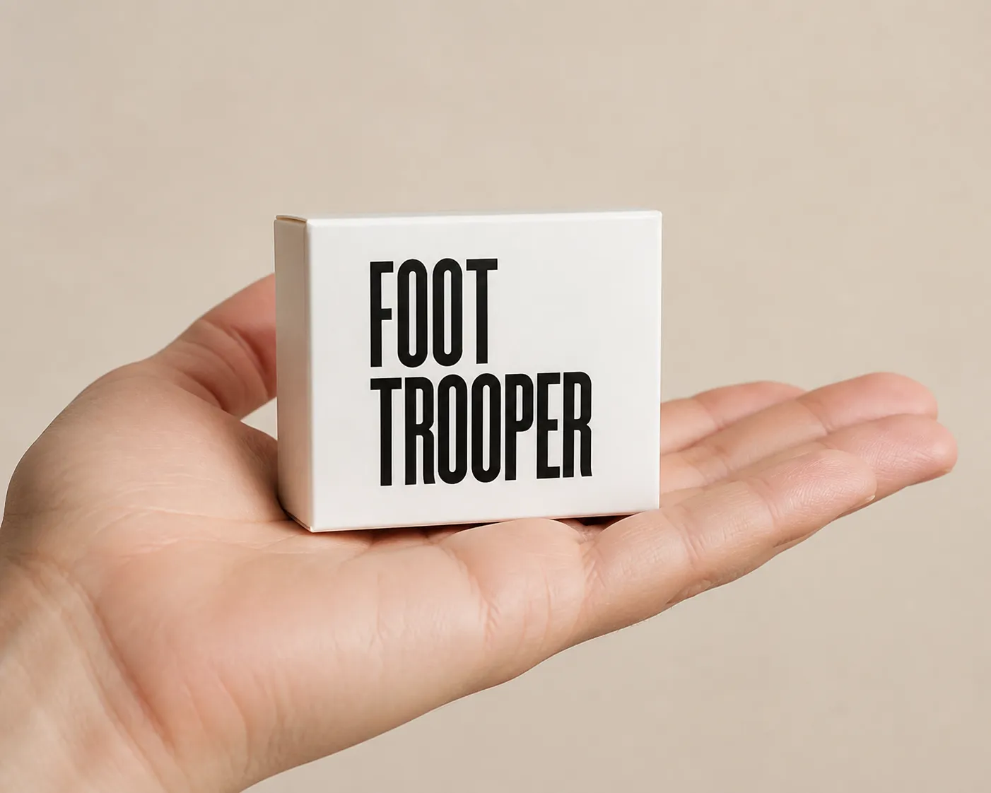 Foot Trooper — the package held in a hand