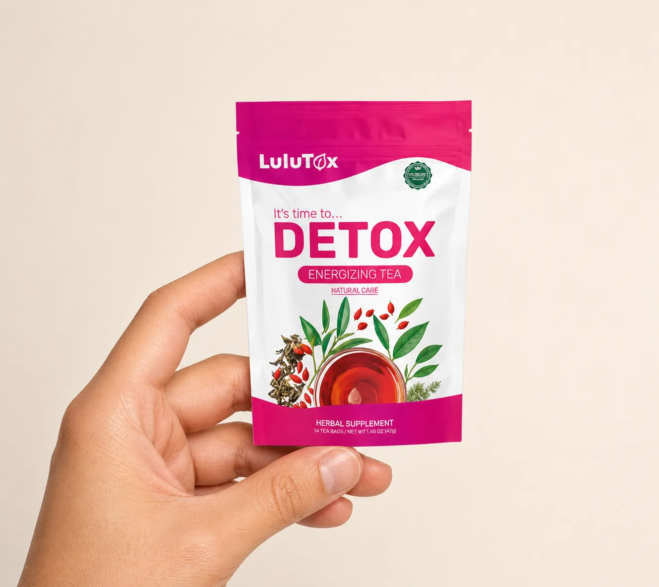 Lulutox Detox Tea — the package held in a hand