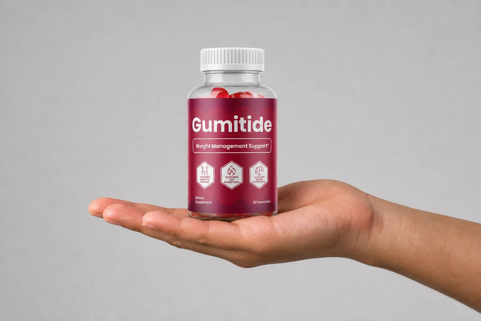Gumitide — the package held in a hand